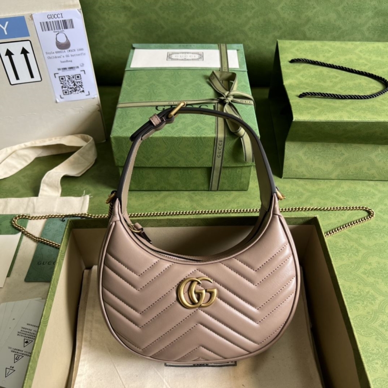 G*u*i top handle bags